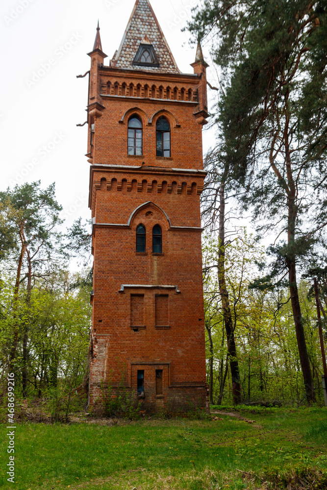Old brick water tower in Natalyevka park in Kharkiv region, Ukraine