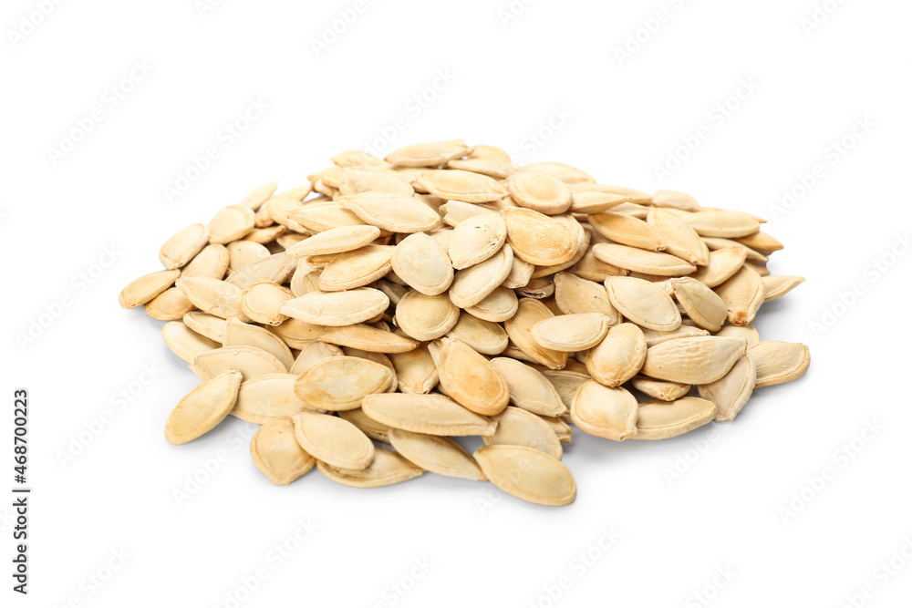 Heap of pumpkin seeds on white background Heap of pumpkin seeds on white background