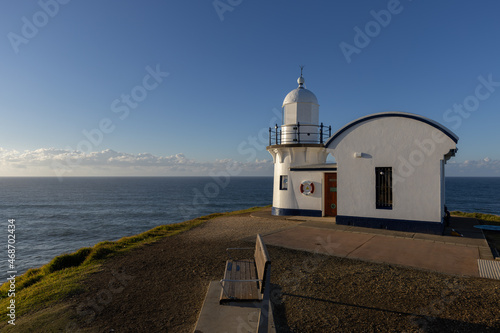 tacking point lighthouse and bench on an autumn morning at port macquarie