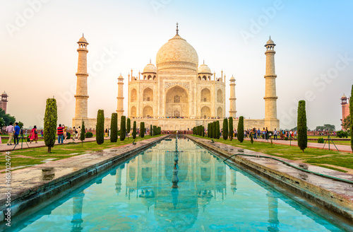 The Taj Mahal is an ivory-white marble mausoleum on the bank of the Yamuna river in the city of Agra, Uttar Pradesh. 