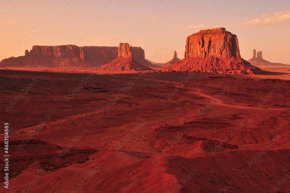 Late afternoon sunlight bathing the buttes and mesas of Monument Valley Navajo Tribal Park, Utah - Arizona border, USA