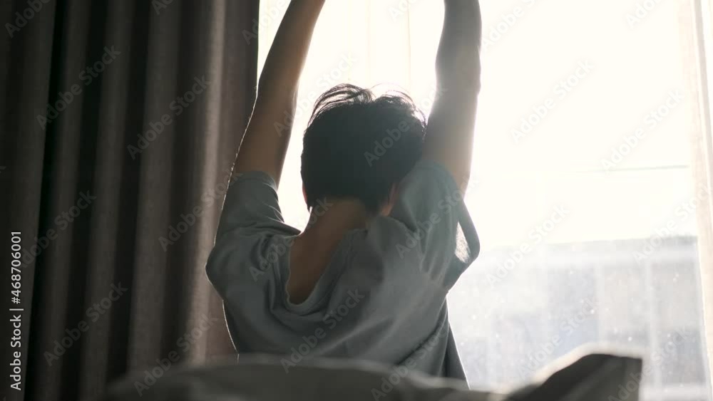 Beautiful women short hai Slowly Waking up in the Morning, Stretches and Gets Up from the Bed, Sun Shines on Her From the Big Window. Happy Young Girl Greets New Day in apartment 4k slow motion Beautiful women short hai Slowly Waking up in the Morning, Stretches and Gets Up from the Bed, Sun Shines on Her From the Big Window. Happy Young Girl Greets New Day in apartment 4k slow motion