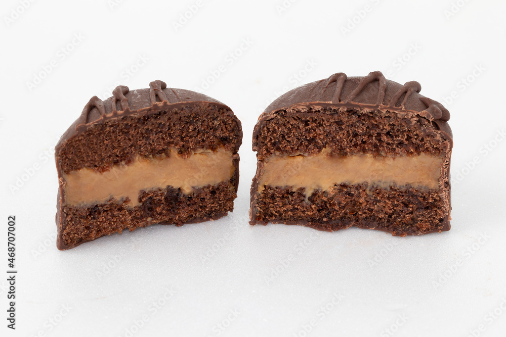 Two halves of honey cookies with dulce de leche. Two halves of honey cookies with dulce de leche.