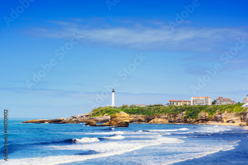 Lighthouse and waves of Biarritz, France photo