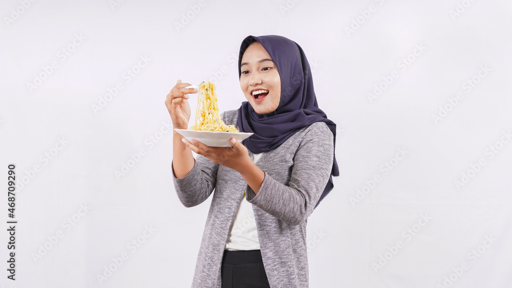 asian girl happily enjoying noodles isolated on white background asian girl happily enjoying noodles isolated on white background