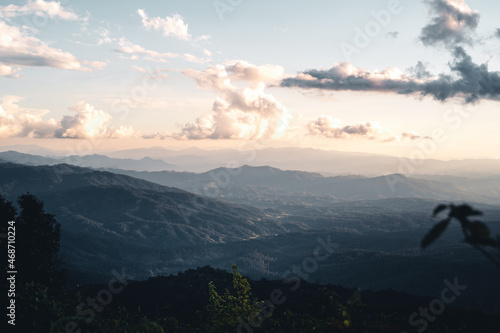 Scenic View Of Mountains Against Sky During Sunset