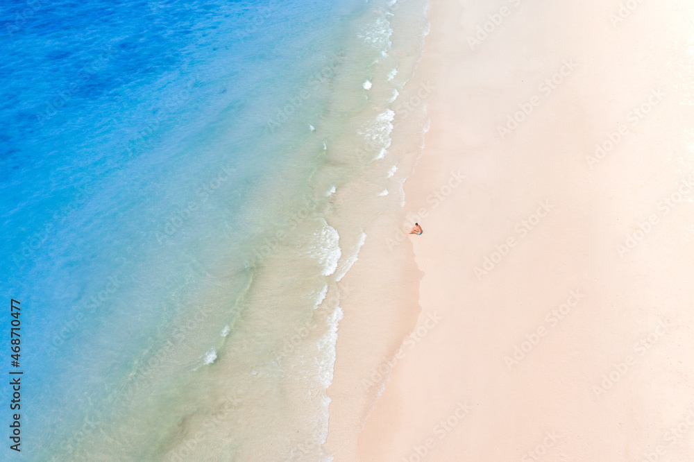 Fototapeta premium High angle view of the sea and sandy beach on the island, beautiful blue water.