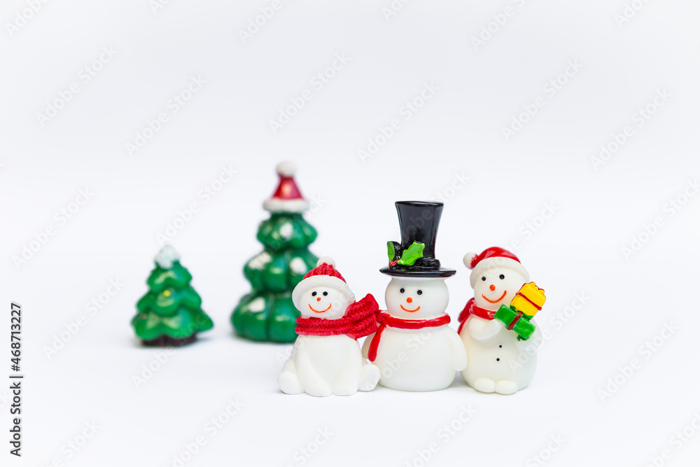 Cute snowman toy set isolate on white background, Christmas decoration item, festive season concept Cute snowman toy set isolate on white background, Christmas decoration item, festive season concept