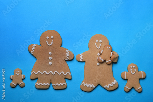 Smiling GingerBread People on Blue Background