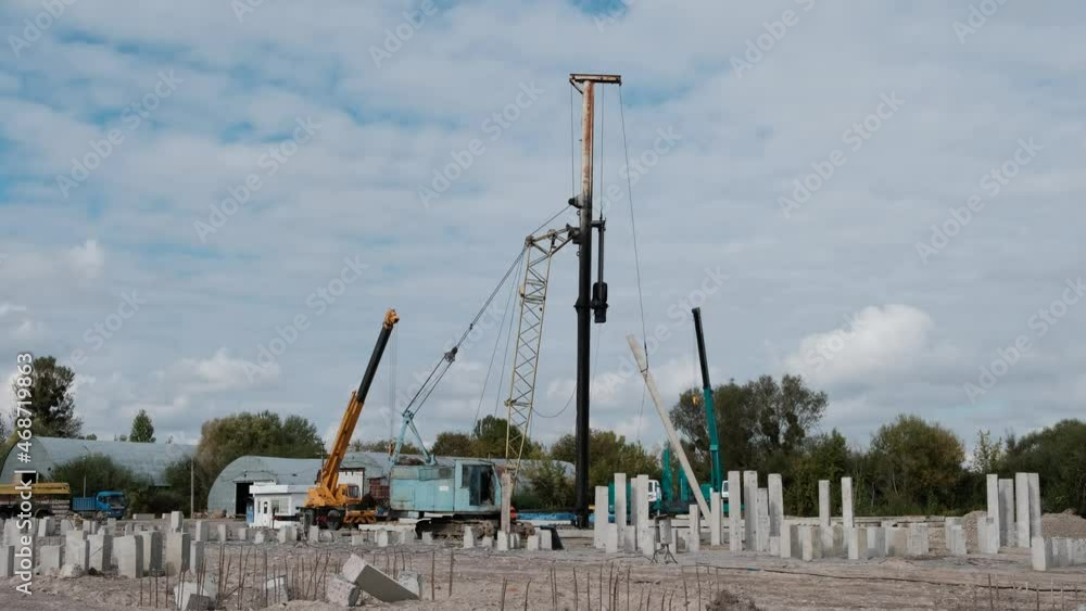 Pile driving. The cargo winch lifts the pile into a vertical position
