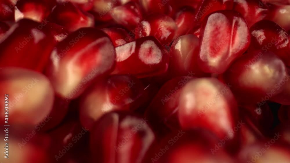 Ingredients for fresh light desserts. Lots of beautiful pomegranate berries in the black background. The concept of dietary nutrition. High quality. 4k footage. Ingredients for fresh light desserts. Lots of beautiful pomegranate berries in the black background. The concept of dietary nutrition. High quality. 4k footage.