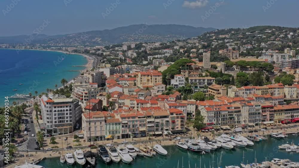 Cannes France Aerial v29 drone flying around eglise notre dame d'esperance at le suquet neighborhood, capturing surrounding cityscape and old port - July 2021 Cannes France Aerial v29 drone flying around eglise notre dame d'esperance at le suquet neighborhood, capturing surrounding cityscape and old port - July 2021