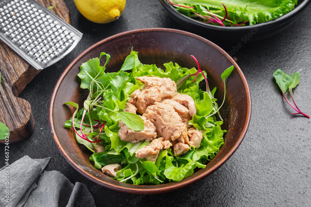 Cod liver salad seafood mix lettuce leaves fish omega-3 fresh meal snack on the table copy space food background keto or paleo diet vegetarian food no meat pescetarian diet Cod liver salad seafood mix lettuce leaves fish omega-3 fresh meal snack on the table copy space food background keto or paleo diet vegetarian food no meat pescetarian diet