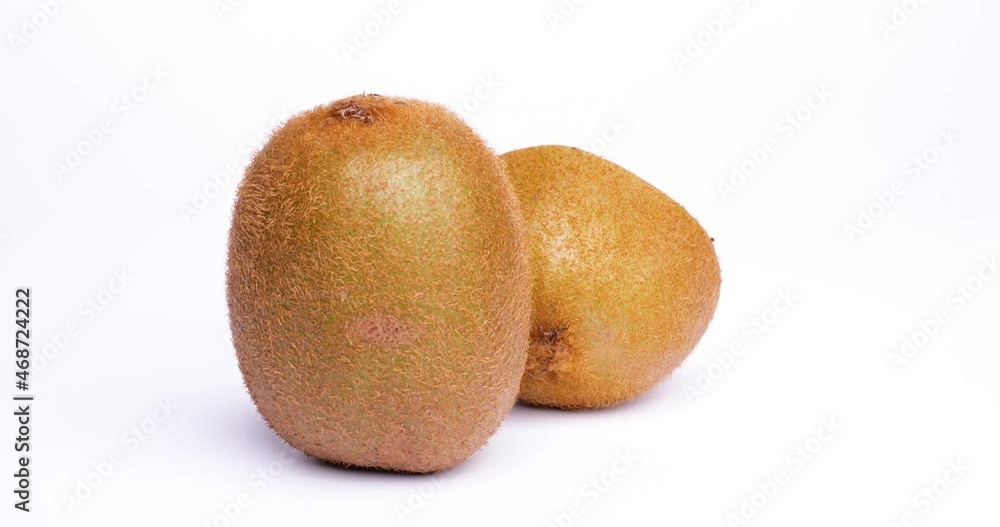Video of Kiwifruit turning on a white background. Video of Kiwifruit turning on a white background.