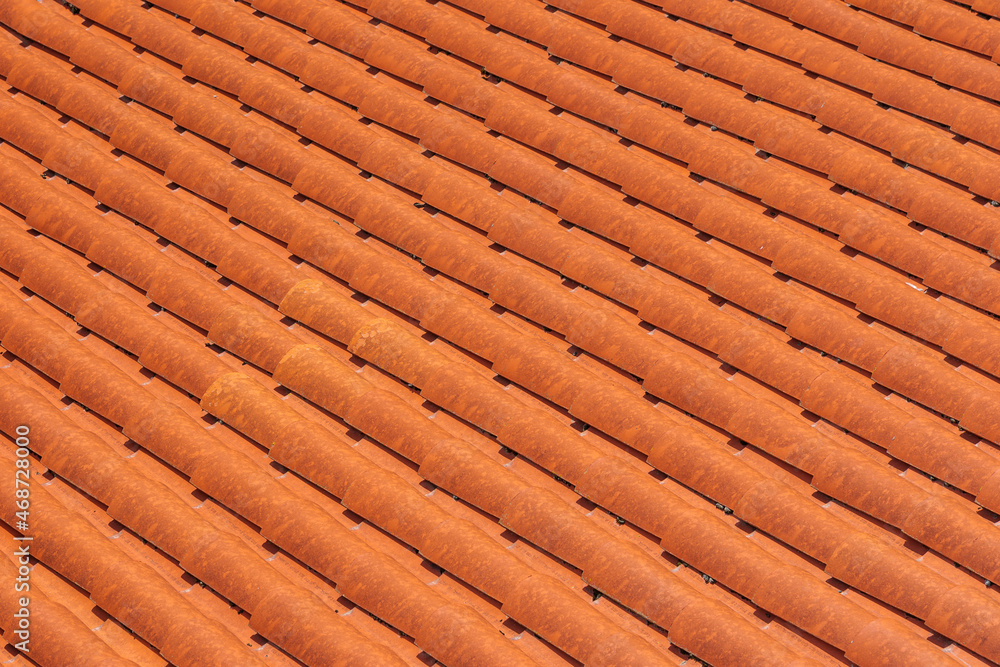 Close-up of new clay ceramic roof tiles on a building