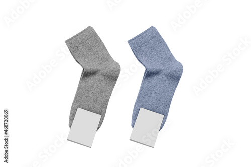 Set of socks with unbranded mockup label tag isolated on white background.