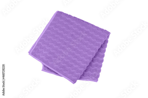 Purple folded microfiber towel isolated on white background, top view.