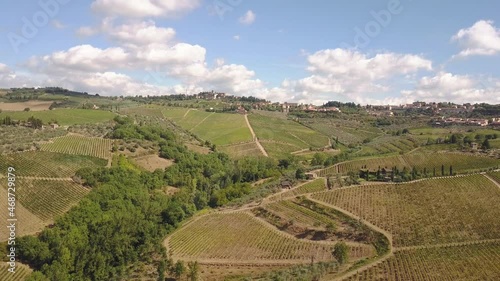 circulair flying droneshot over grape fields in Tuscany, Italy 4k photo
