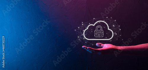 Business man hold,holding cloud computing data and security on global networking,Padlock and cloud icon. Technology of business.Cybersecurity and information or network protection.internet project