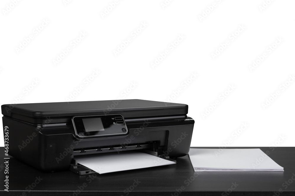 Laser home printer on table against white backgorund Laser home printer on table against white backgorund