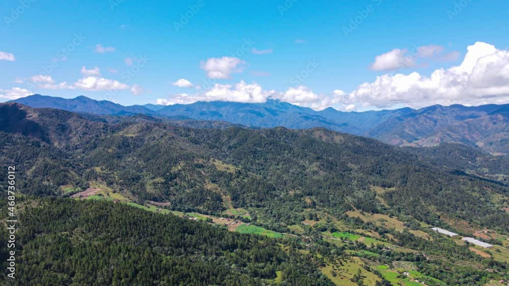 Mountain range aerial view in a caribbean country with clouds and the blue sky, Manabao, Dominican Republic Mountain range aerial view in a caribbean country with clouds and the blue sky, Manabao, Dominican Republic