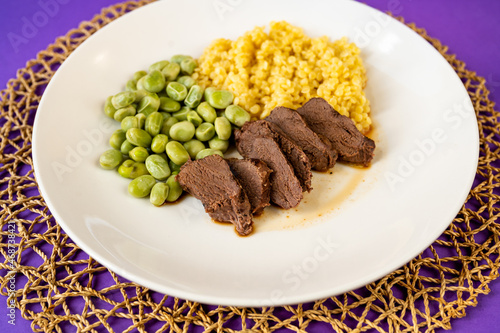 Deer meat, boiled broad bean and semolina pasta 