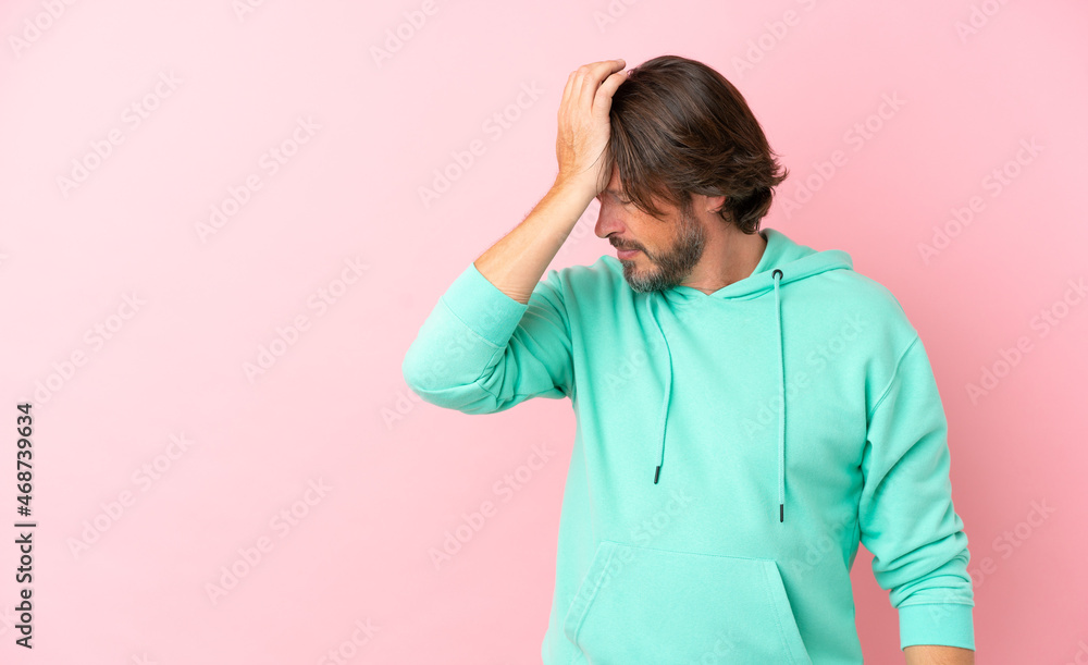 Senior dutch man isolated on pink background with headache Senior dutch man isolated on pink background with headache