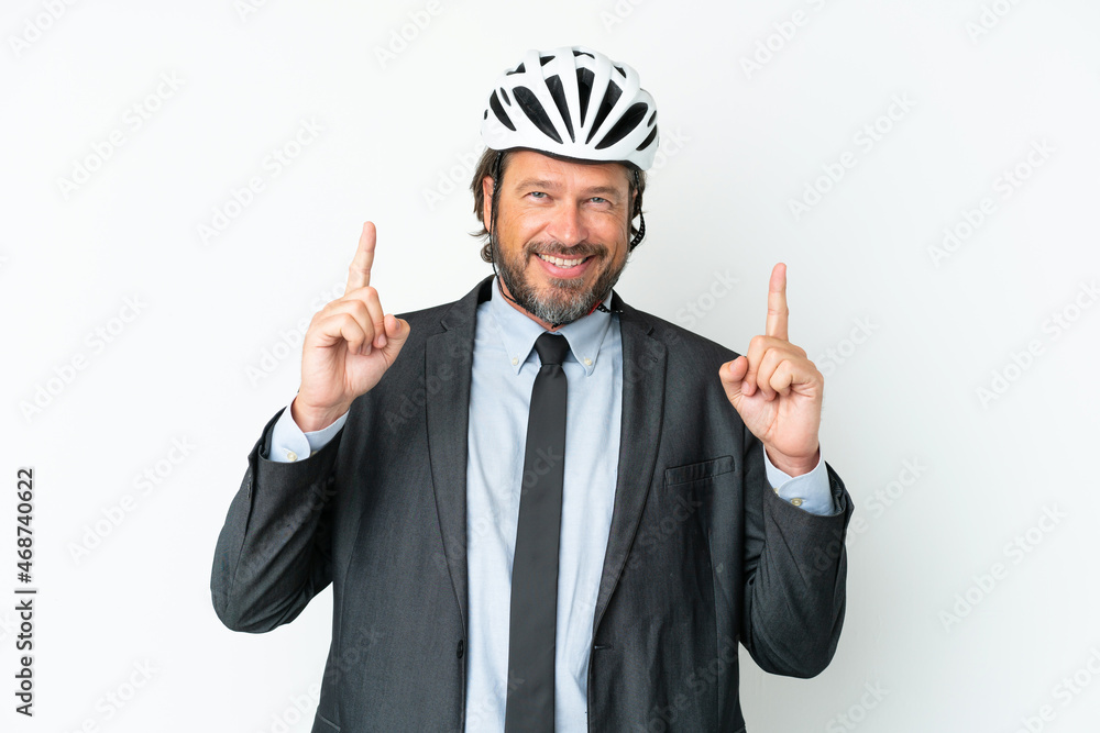 Business senior man with a bike helmet isolated on white background pointing up a great idea Business senior man with a bike helmet isolated on white background pointing up a great idea