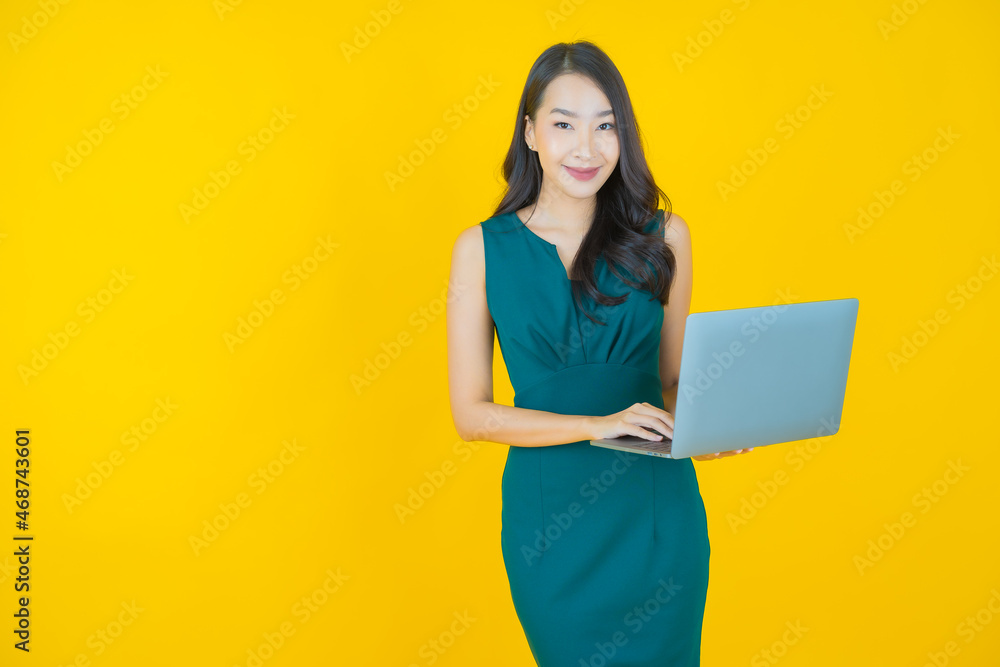 Portrait beautiful young asian woman smile with computer laptop Portrait beautiful young asian woman smile with computer laptop