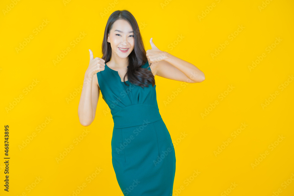 Portrait beautiful young asian woman smile with action Portrait beautiful young asian woman smile with action