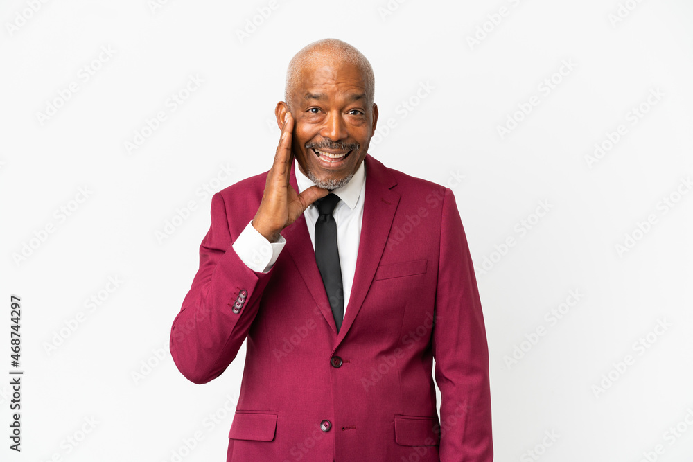 Cuban senior isolated on white background with surprise and shocked facial expression Cuban senior isolated on white background with surprise and shocked facial expression
