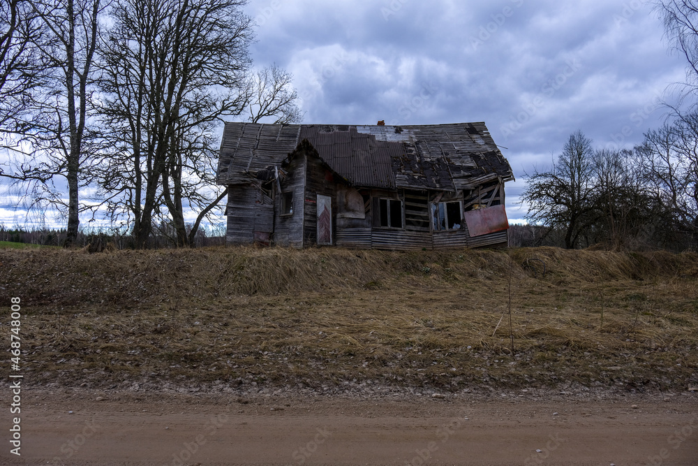 old countryside barn from wooden planks and concrete in rural area old countryside barn from wooden planks and concrete in rural area