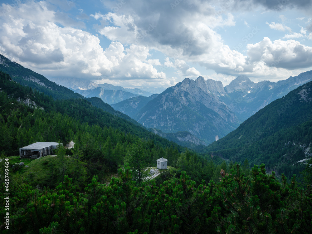 summer mountain tops and peaks under blue cloudy sky in Slovenia national Triglav park