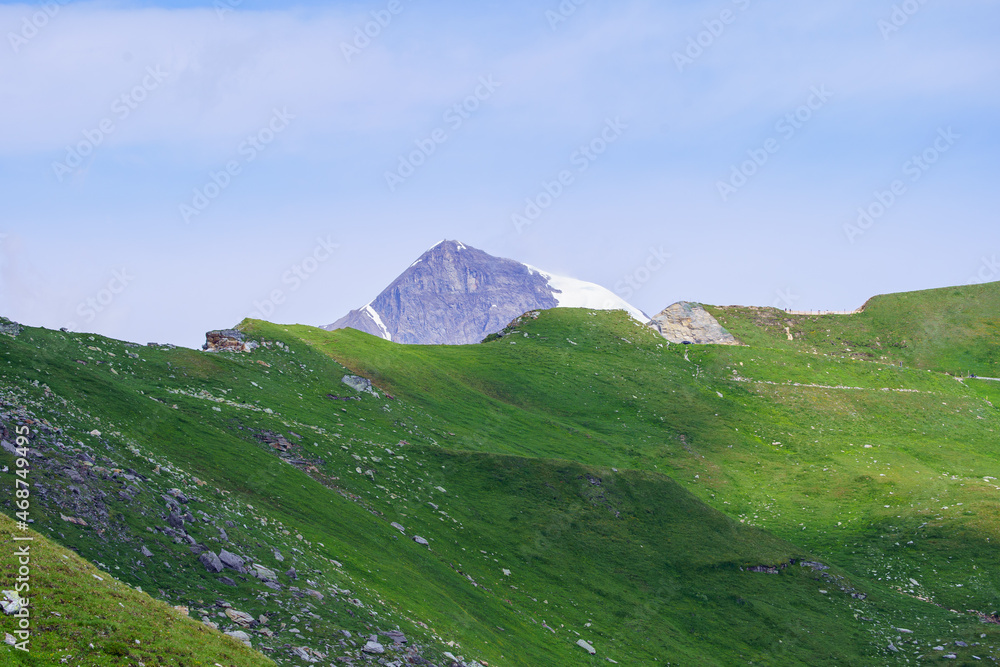 Fototapeta premium summer green Alps mountains in Austria with snowy peaks
