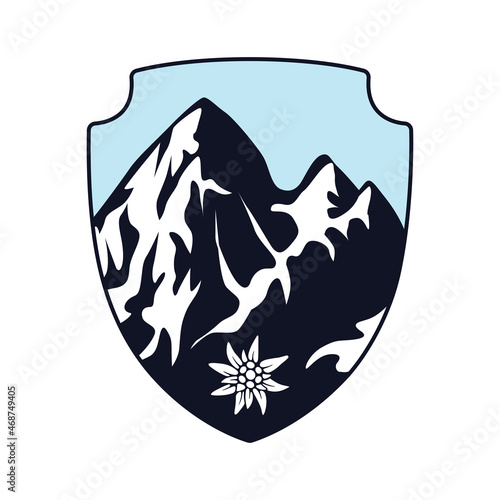 The Alps icon. Snow-capped mountains inscribed in the shape of a shield with an Edelweiss flower. The emblem of mountaineering. Vector illustration isolated on a white backgroundb.
