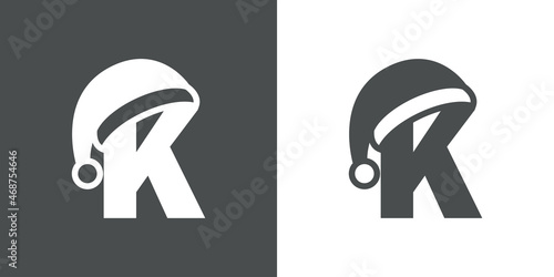 Logotipo con letra inicial K con silueta de sombrero de Papá Noel en fondo gris y fondo blanco, para su uso en invitaciones y tarjetas de felicitación