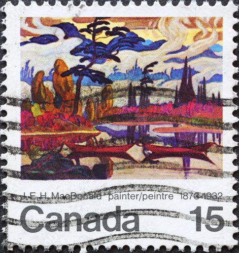 CANADA - CIRCA 1973: A postage stamp from Canada showing a landscape picture of James Edward Hervey MacDonald (1873-1932) Birth Centenary