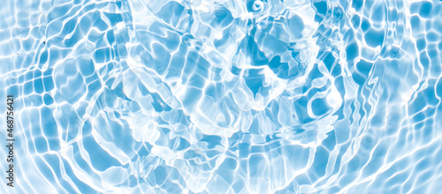 Water panoramic banner background. water texture, aqua surface with rings and ripples