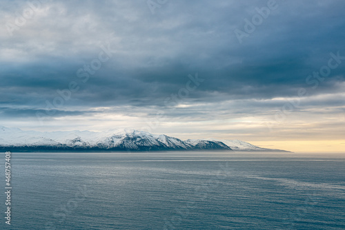 Wallpaper Mural Iceland Flateyjarskagi northern highlands with snow covered mountains surrounded by calm sea Torontodigital.ca