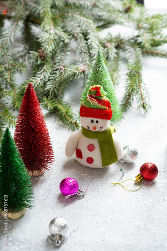 Funny snowman home decor for winter holiday concept and new year tree