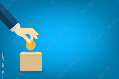 Donate, donation concept. Human hand with gold coin and donation box. 