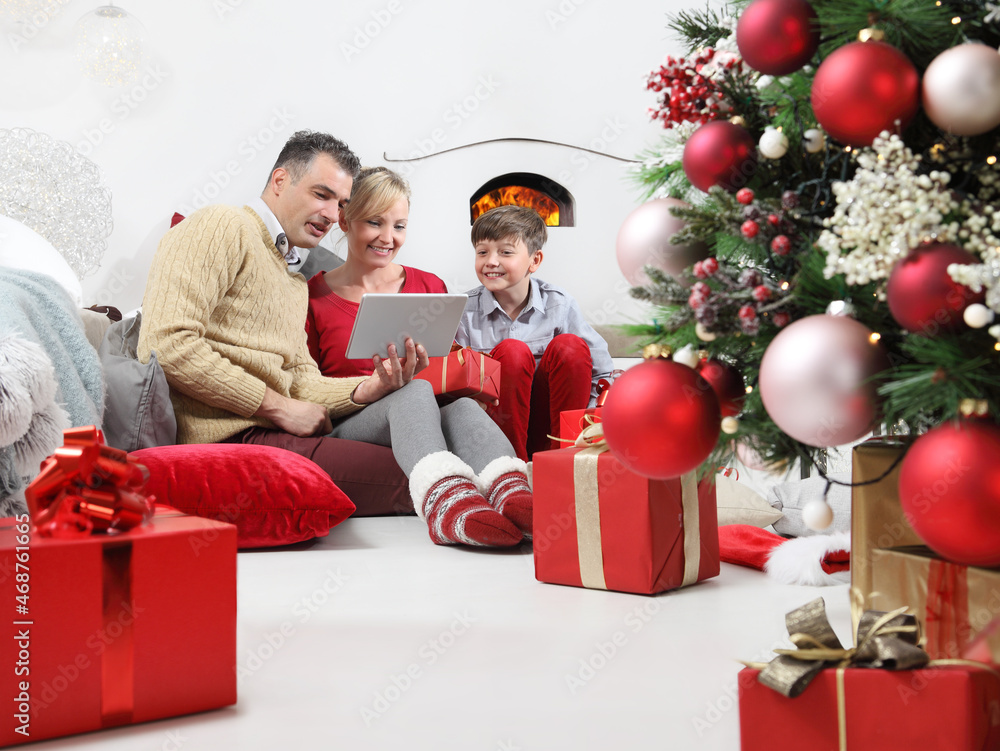 merry christmas, happy family stay at home alone because of the coronavirus, communicates with digital tablet remotely, christmas lockdown concept merry christmas, happy family stay at home alone because of the coronavirus, communicates with digital tablet remotely, christmas lockdown concept