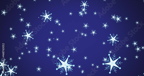 Image of christmas snowflakes falling over blue background