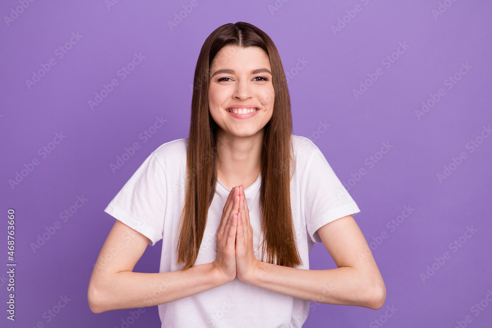 Portrait of attractive cheerful girl asking you favor pleading isolated over bright purple violet color background Portrait of attractive cheerful girl asking you favor pleading isolated over bright purple violet color background