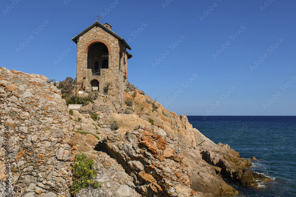Exterior of the Chapel, place of prayer located on a rocky cliff overlooking the sea, Alassio, Savona, Liguria, Italy	