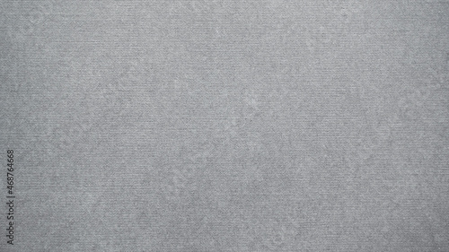 grey textured background, watercolor paper or fabric