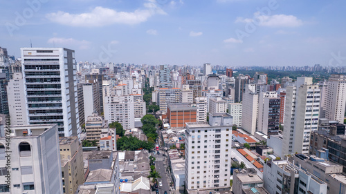 Aerial view of Jardins district in São Paulo, Brazil. Big residential and commercial buildings in a prime area near Av. Paulista with Ibirapuera Park on background. 