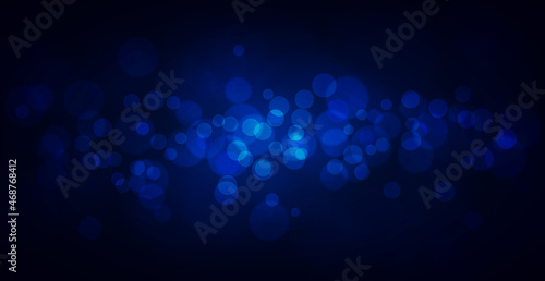 Abstract blue bokeh background with defocused circles and glitter. Decoration element for Christmas and New Year holidays, greeting cards, web banners, posters - Vector © BEMPhoto