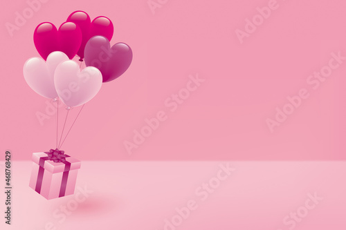 桃色のハート形風船とギフトボックスのイラスト