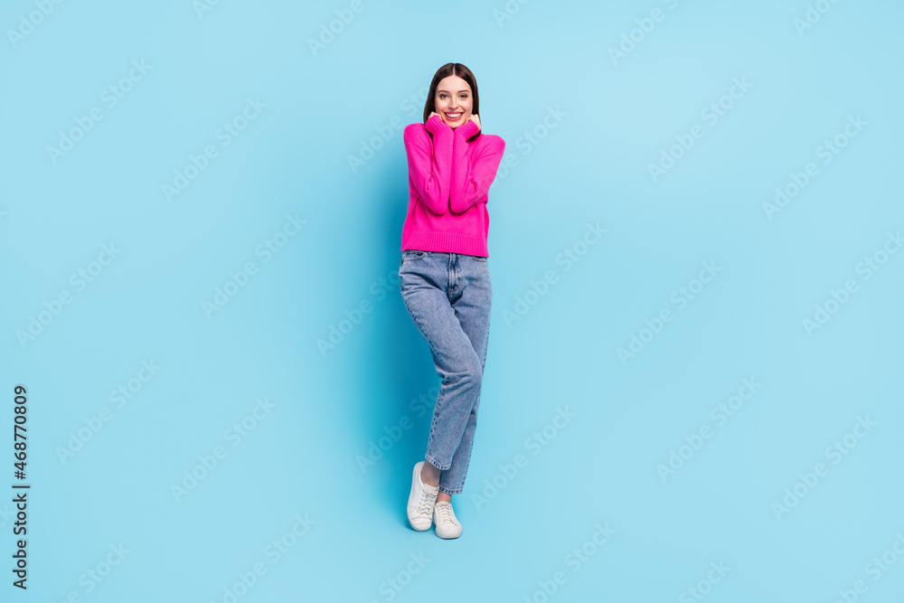 Full length body size view of attractive cheerful girl enjoying good mood posing isolated over bright blue color background